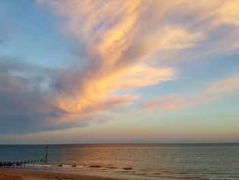 Scenic view of sea against dramatic sky