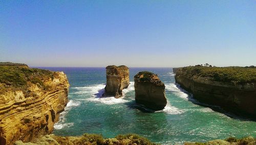 Scenic view of sea against blue sky