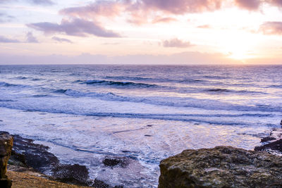 Scenic view of sea against sky during sunset