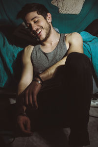 Midsection of a smiling young woman