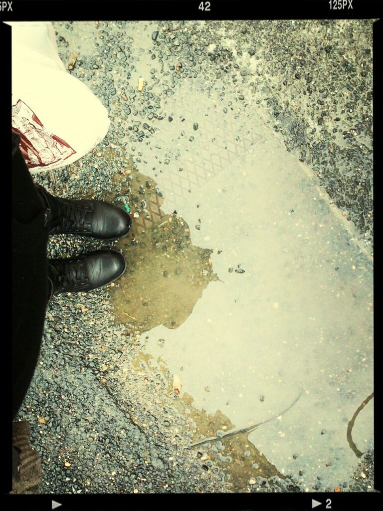 transfer print, sand, beach, water, auto post production filter, high angle view, wet, shore, footprint, puddle, street, reflection, outdoors, asphalt, shadow, day, sunlight, nature, sea, tranquility