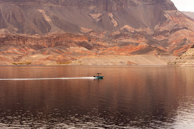 High angle view of man standing in lake