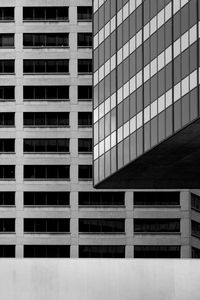 Low angle view of modern building in city against sky