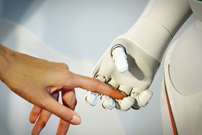 Close-up of hands holding camera