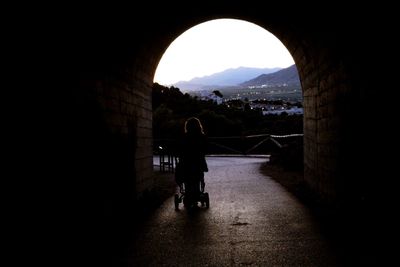 Woman walking in corridor