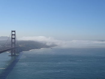 View of suspension bridge over river