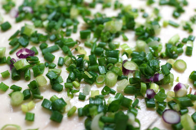 Close-up of chopped vegetables on table