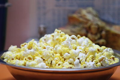 Close-up of popcorn in plate on table