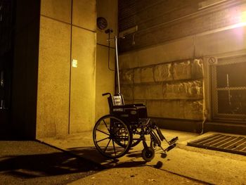 Bicycle against wall in building