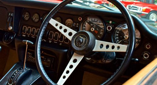 Close-up of steering wheel in car