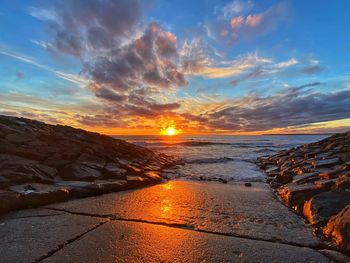 Scenic view of sea against sky during sunset