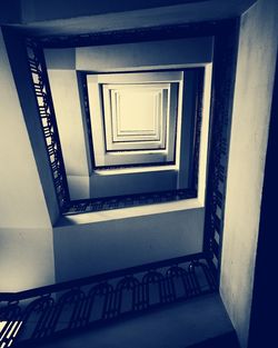 Directly below shot of spiral staircase of building