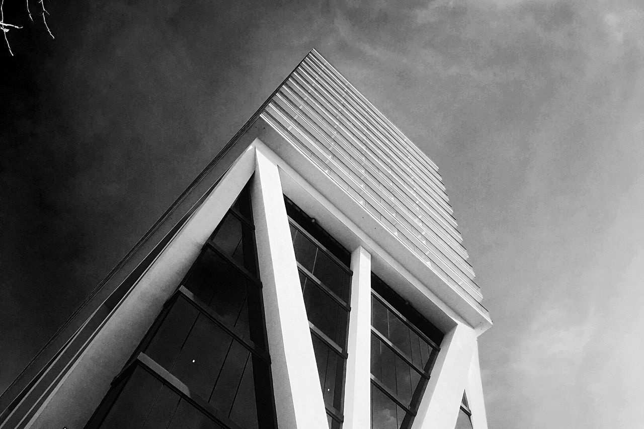 LOW ANGLE VIEW OF MODERN BUILDINGS AGAINST SKY