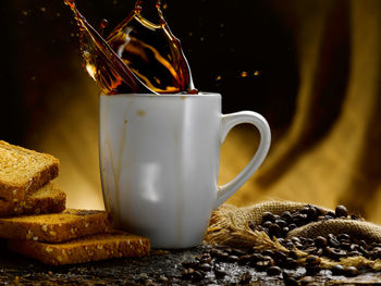 Close-up of coffee cup on table