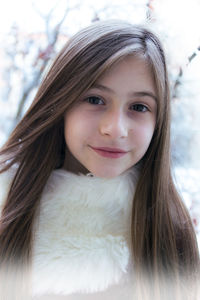 Close-up portrait of smiling girl