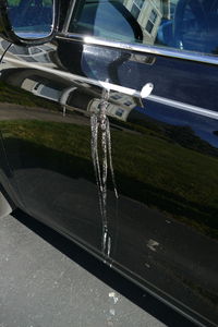 Close-up of airplane on road