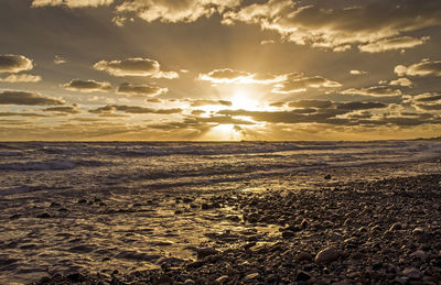 Scenic view of beach during sunset