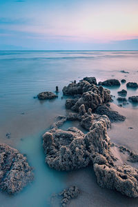 Scenic view of sea against sky during sunset
