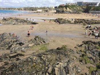 High angle view of people on beach against sky