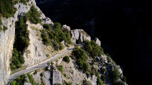 High angle view of stream amidst rocks