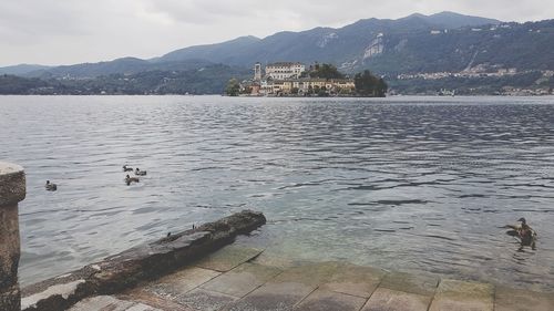 View of lake with mountain range in background