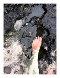 Low section of woman in water