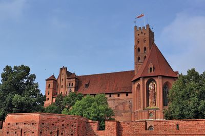 Low angle view of historic building against sky