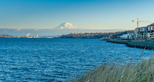 A view of the port of tacoma and mount rainier from ruston, washington.