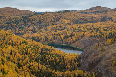 Scenic view of lake against sky during autumn