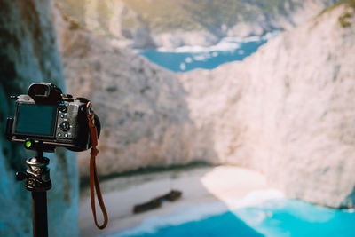 Close-up of camera on rock