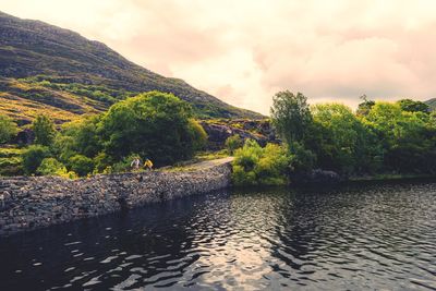 Scenic view of river against sky