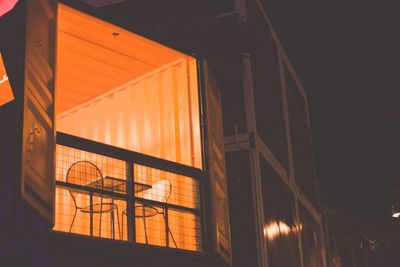 Low angle view of built structure at sunset