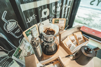 High angle view of coffee cups on table