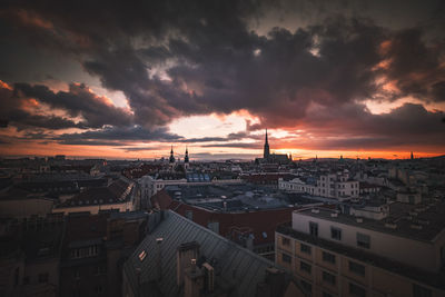 High angle view of townscape against sky at sunset