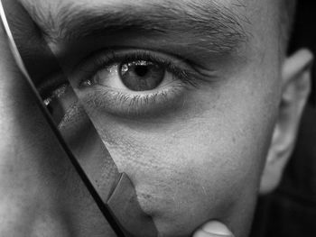 Close-up portrait of man with knife