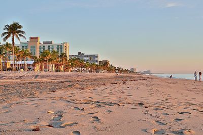 Scenic view of beach against clear sky