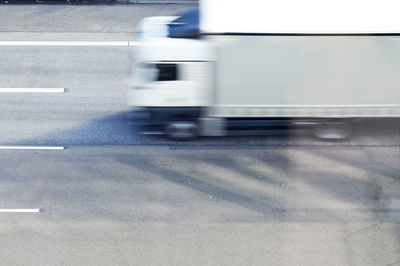 Blurred motion of vehicles on road