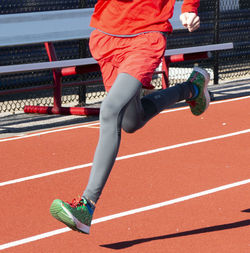 Low section of man running