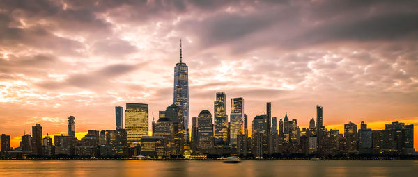 Modern buildings in city against cloudy sky.new york city, united states of america