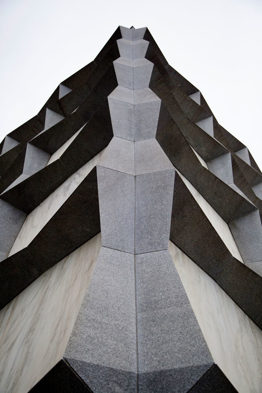 architecture, built structure, sky, no people, building exterior, low angle view, building, clear sky, day, shape, pattern, symmetry, modern, geometric shape, travel destinations, nature, outdoors, office building exterior, city, directly below, skyscraper, digital composite