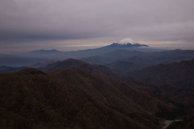 Scenic view of mountains against sky during sunset