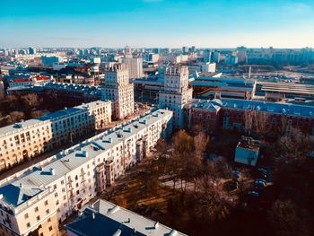 High angle view of buildings in city against sky