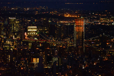 Illuminated cityscape at night