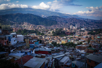 Aerial view of town against sky