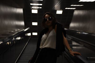 Portrait of woman at subway station