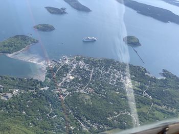 High angle view of sea seen through windshield