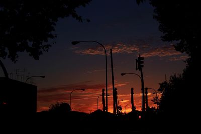 Silhouette of street lights and signals