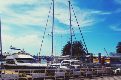 Boats moored at harbor