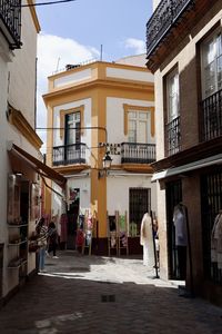 Rear view of woman walking on street