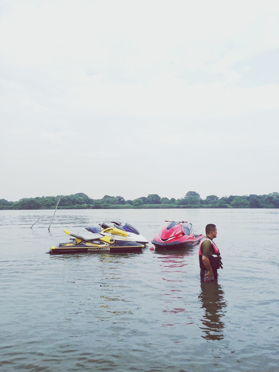 nautical vessel, transportation, water, boat, mode of transport, waterfront, men, lifestyles, leisure activity, lake, sky, travel, nature, moored, oar, sailing, rippled